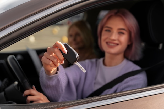 Free photo woman taking her driver's license test in vehicle