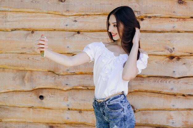 Woman taking a photo of herself