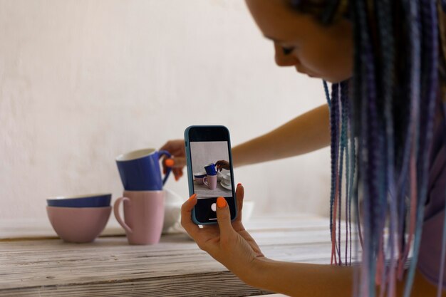 Woman taking photos for her business