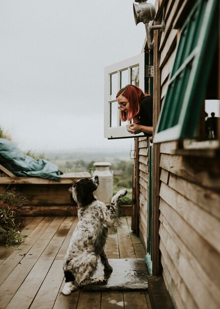 Free Photo woman talking with her dog