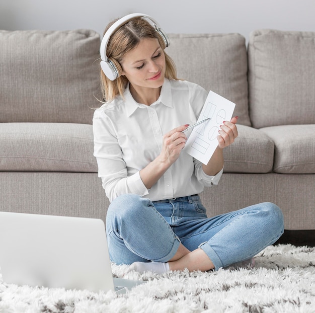 Woman teaching her students online