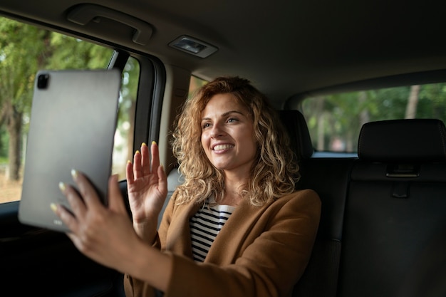 Free photo woman traveling with her car