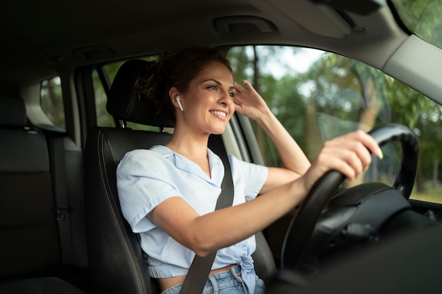 Woman traveling with her car