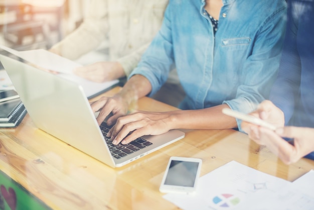 Woman typing in a laptop