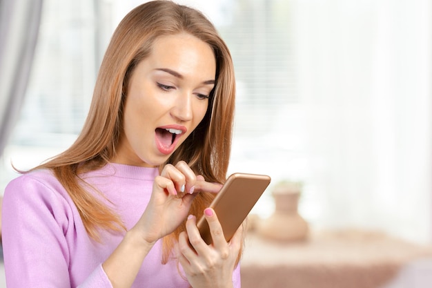 Woman uses a smartphone