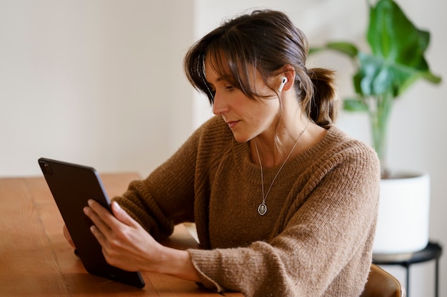 Woman using digital tablet technology