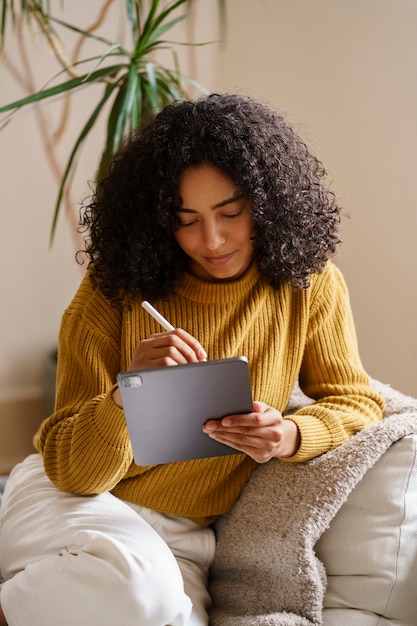 Woman using digital tablet technology