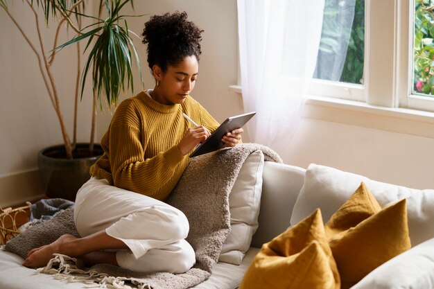 Woman using digital tablet technology