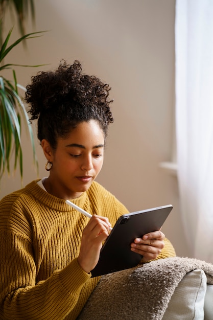 Woman using digital tablet technology