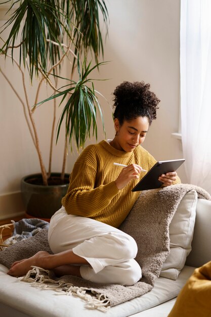 Woman using digital tablet technology