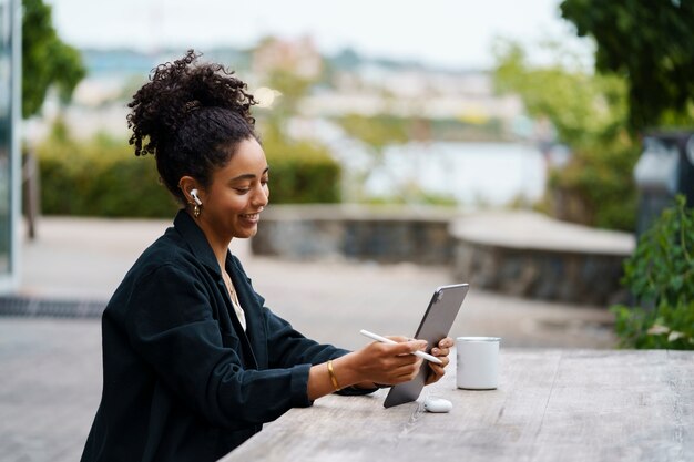 Woman using digital tablet technology