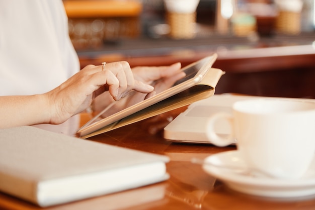 Woman using digital tablet