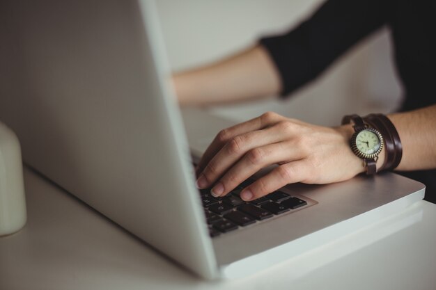 Free photo woman using laptop