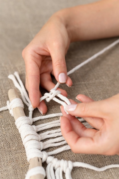 Woman using the macrame technique