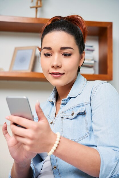 Woman using mobile phone