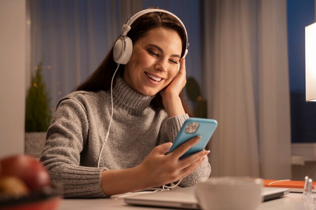 Woman using smartphone as a habit