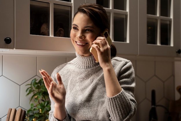 Free Photo woman using smartphone as a habit