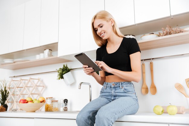 Woman using tablet computer