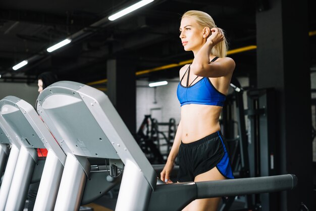 Woman walking on treadmill