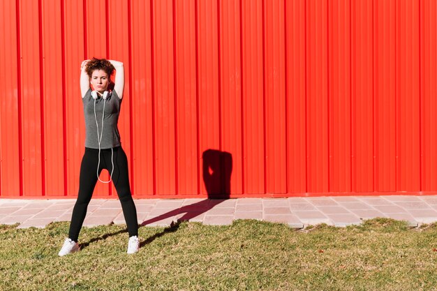 Woman warming up shoulder muscles