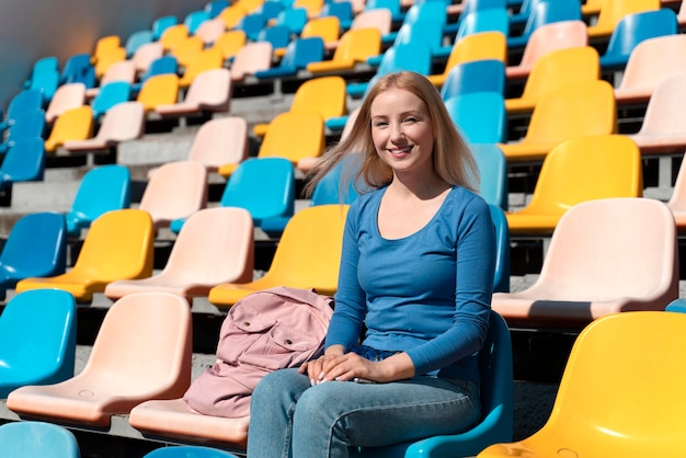 Woman watching a football game