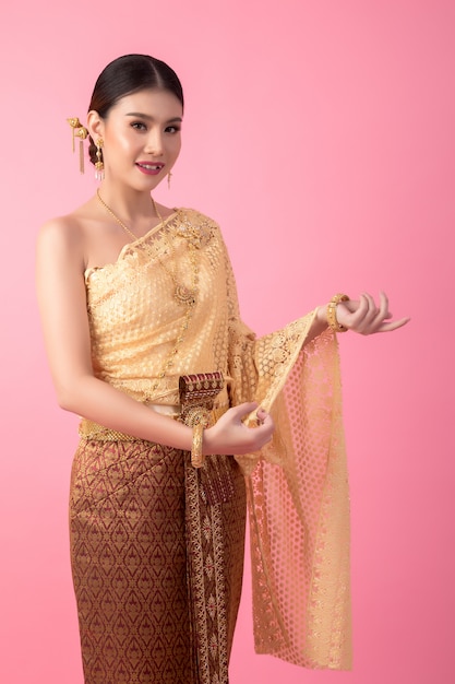 A woman wearing an ancient Thai dress