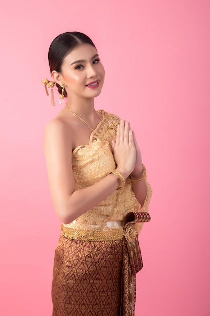 A woman wearing an ancient Thai dress