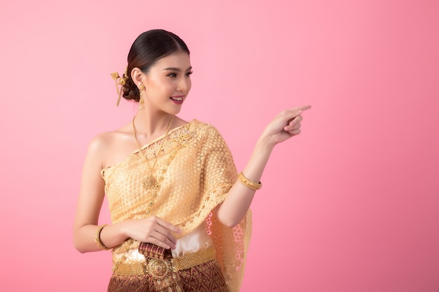 A woman wearing an ancient Thai dress