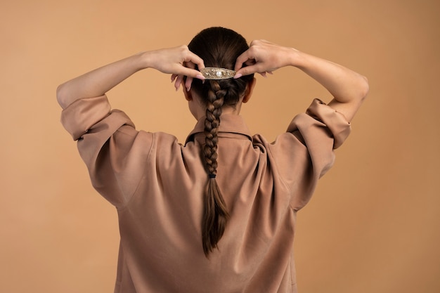 Free photo woman wearing big hair clip medium shot