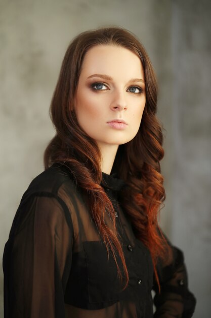 Woman wearing black mesh shirt