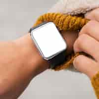 Free photo woman wearing a blank smartwatch close-up