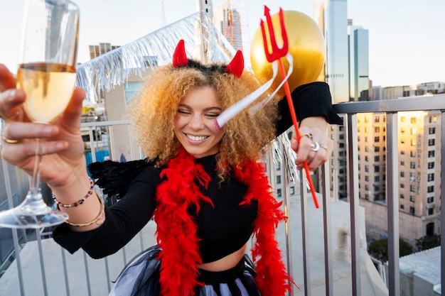 Woman wearing costume at party medium shot