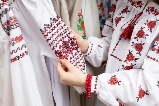 Free Photo woman wearing embroidered shirt