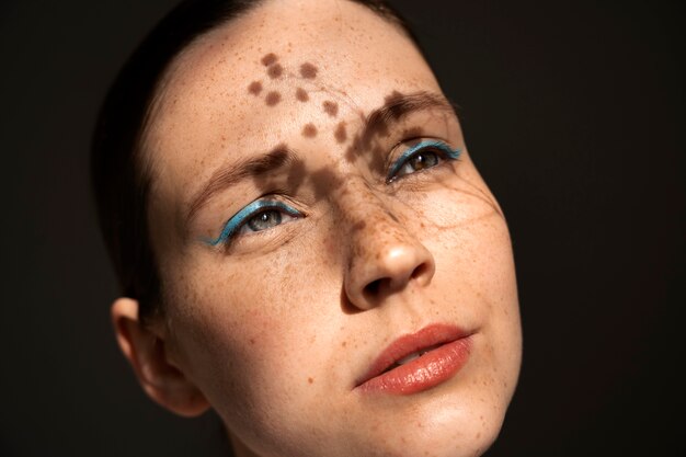 Woman wearing  makeup with thick eyebrows