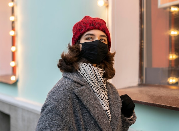 Woman wearing medical mask in the city