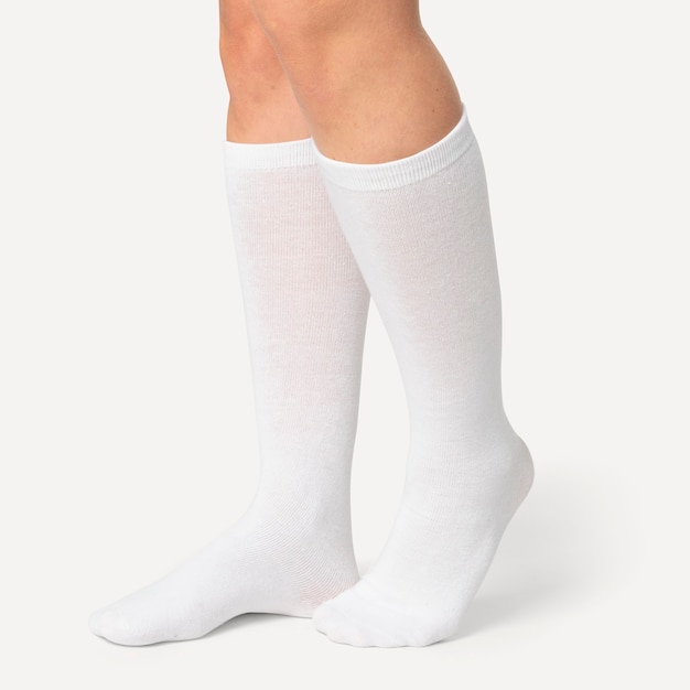 Woman wearing plain white knee high socks