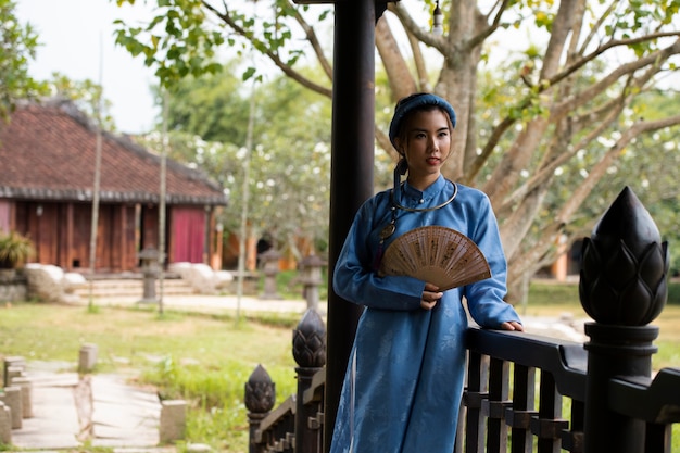 Woman wearing traditional ao dai clothing