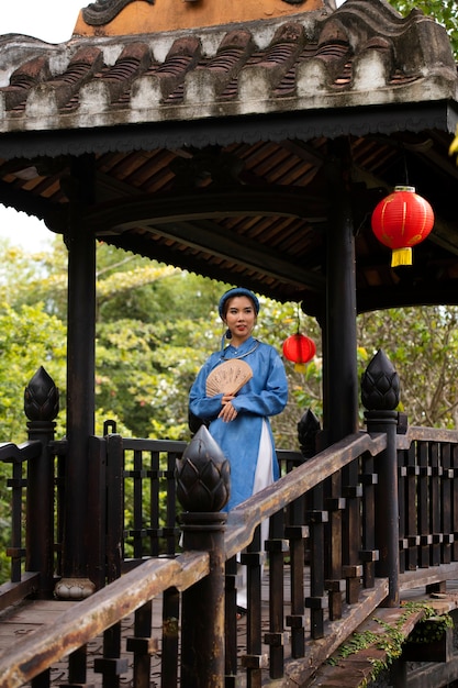 Woman wearing traditional ao dai clothing