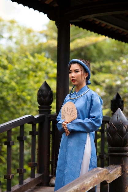 Woman wearing traditional ao dai clothing