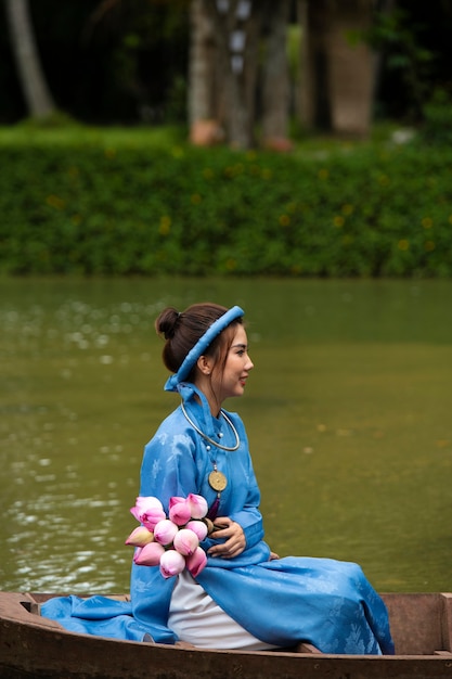 Woman wearing traditional ao dai clothing