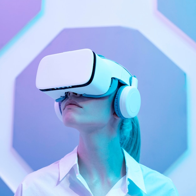 Woman wearing virtual reality simulator