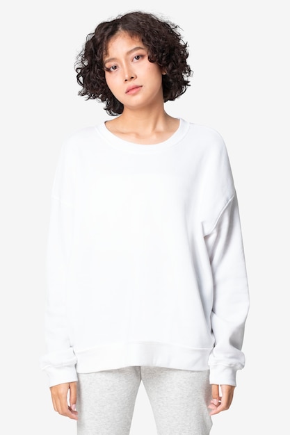 Free Photo woman in white basic sweater casual apparel