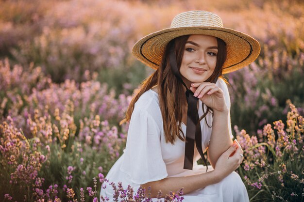 Woman in white dress in a lavander field