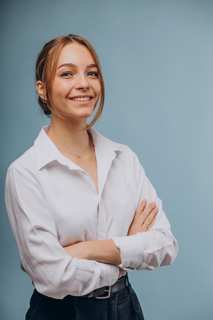 Free photo woman in white shirt showing emotions on blue