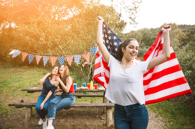 Free Photo woman with american flag