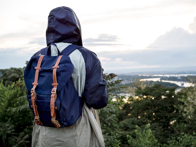 Free Photo woman with backpack  on mountain top