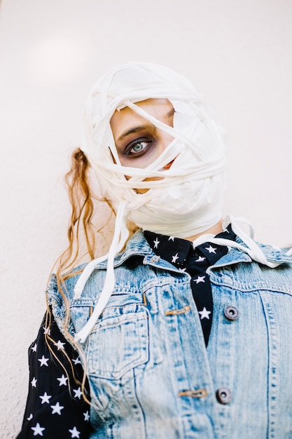 Free Photo woman with bandage looking with one eye