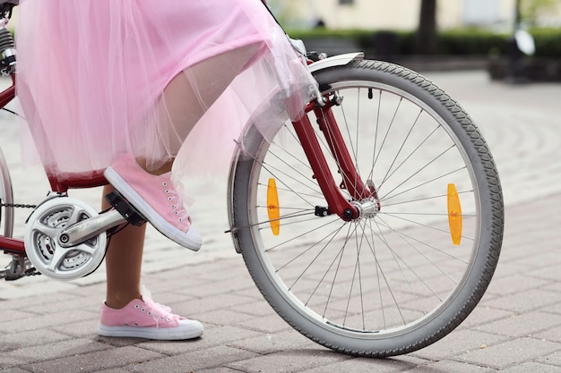 Free Photo woman with bicycle