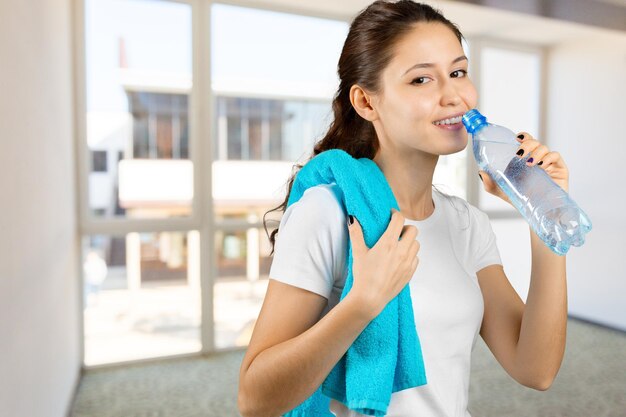 Woman with bottle of water