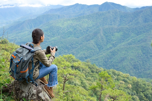 A woman with a camera World photographer day.